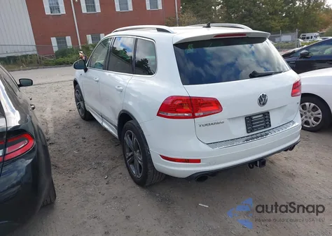 2014 Volkswagen Touareg 3.6L R-Line z USA, uszkodzony, nr VIN WVGDF9BP3ED006854
